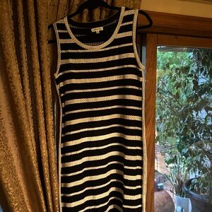 Max studio knit dress size, medium, black and cream color